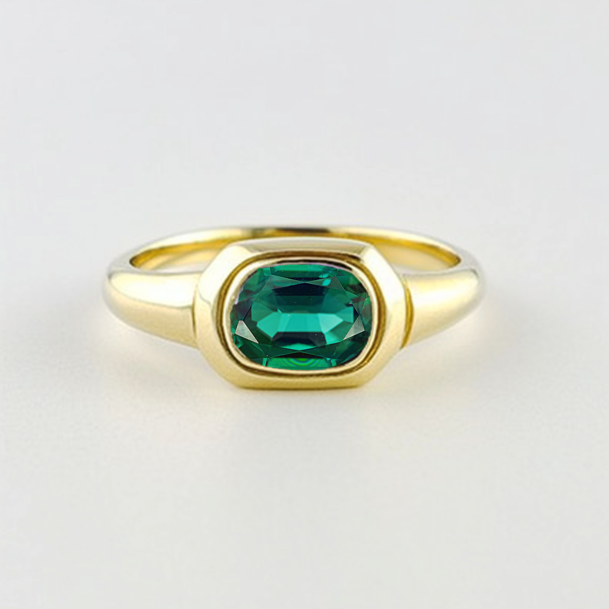 gold and emerald ring